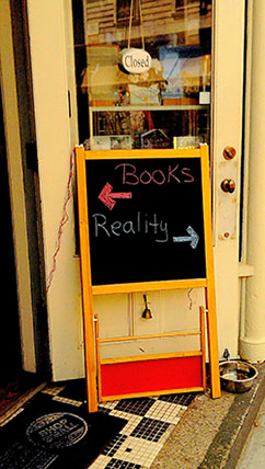books vs real life sign Rhode Island
