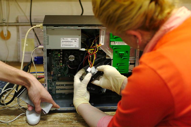 Person building a computer delicately