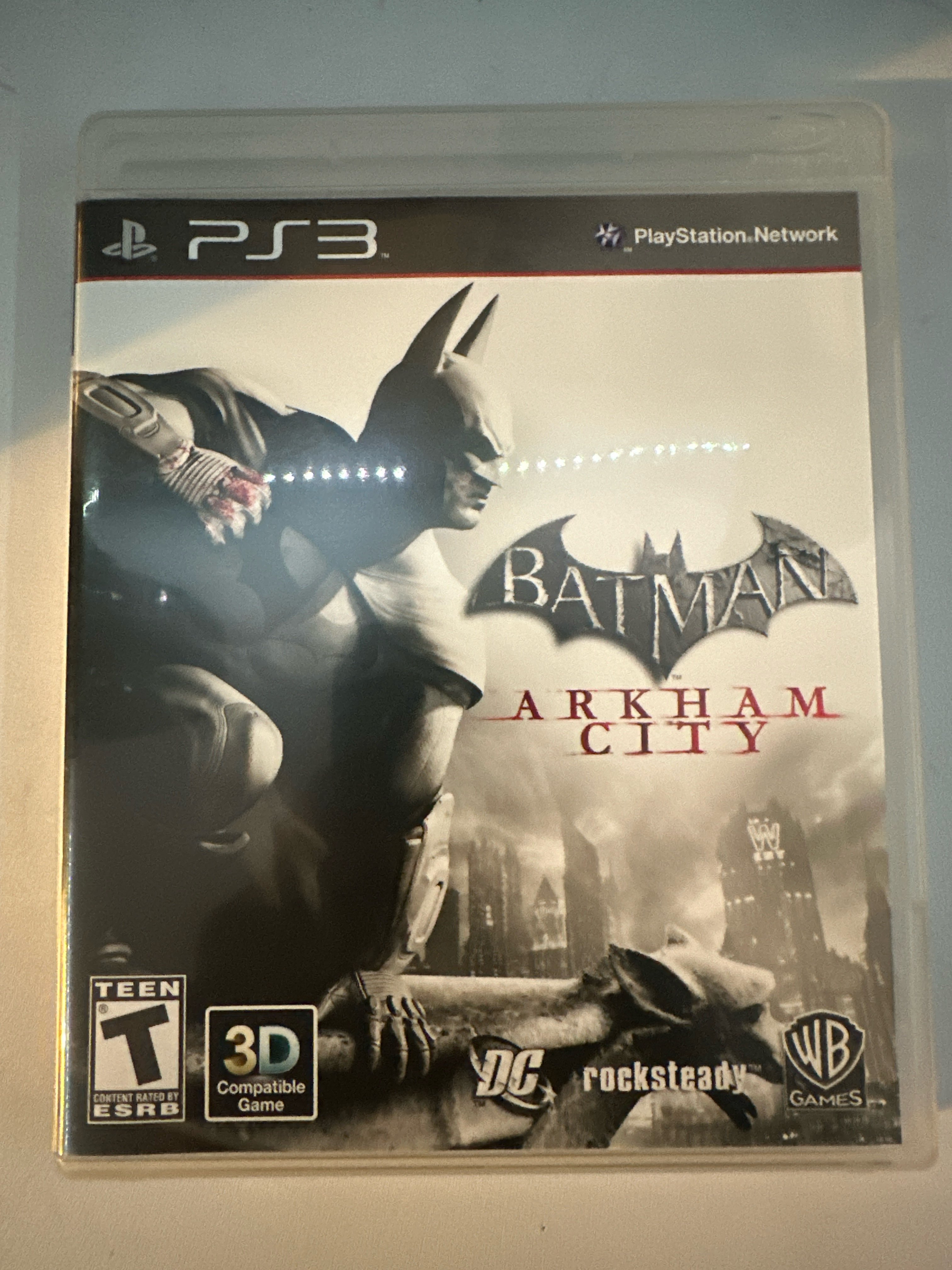 Picture of my own copy of Batman Arkham City Ps3. Taken by Abyan Ahmed, 4 Apr. 2025. iPhone 14 Pro. © Abyan Ahmed, 2025. CC BY-NC 4.0.
