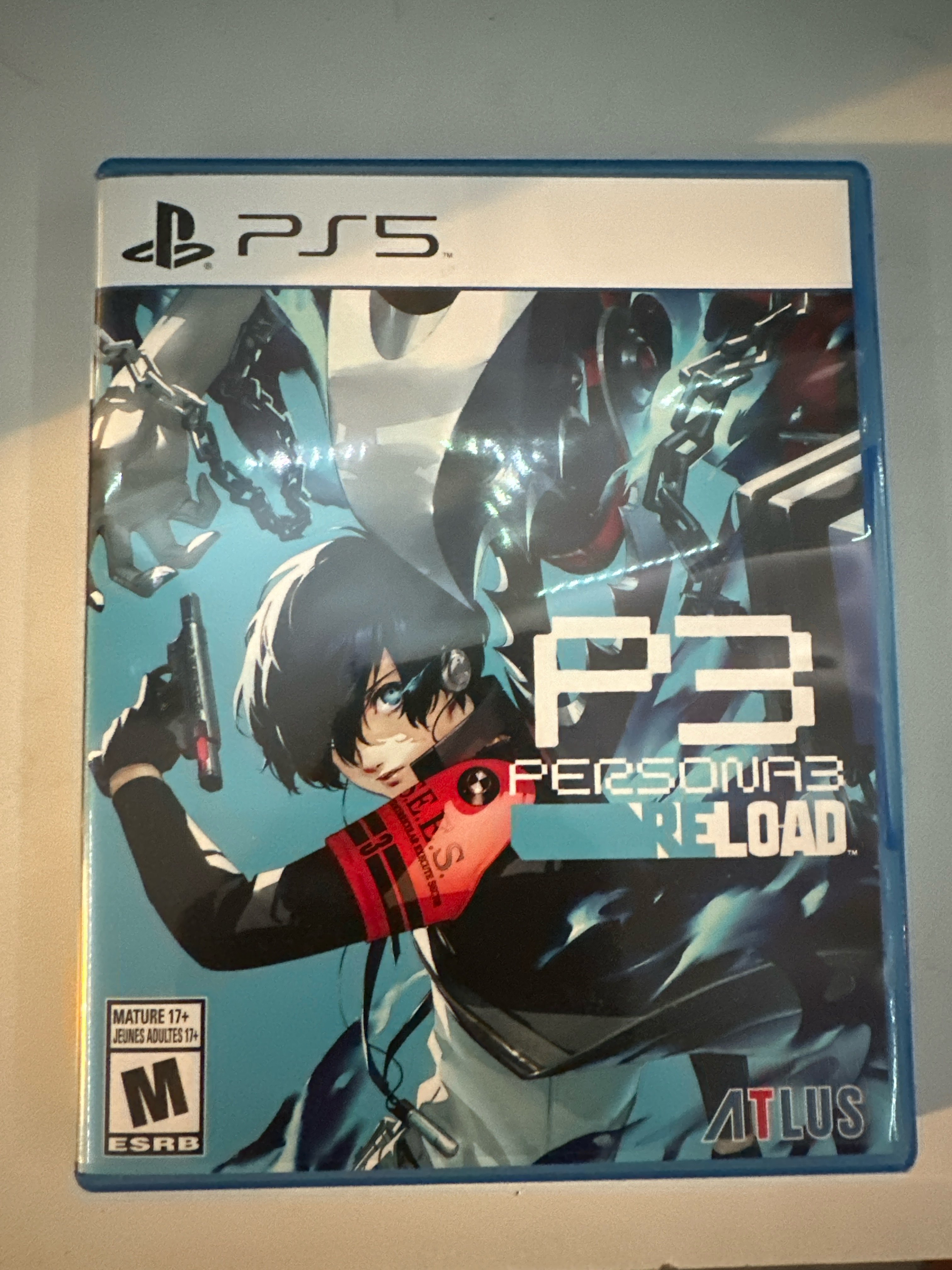 Picture of my own copy of Persona 3 Reload PS5. Taken by Abyan Ahmed, 4 Apr. 2025. iPhone 14 Pro. © Abyan Ahmed, 2025. CC BY-NC 4.0.