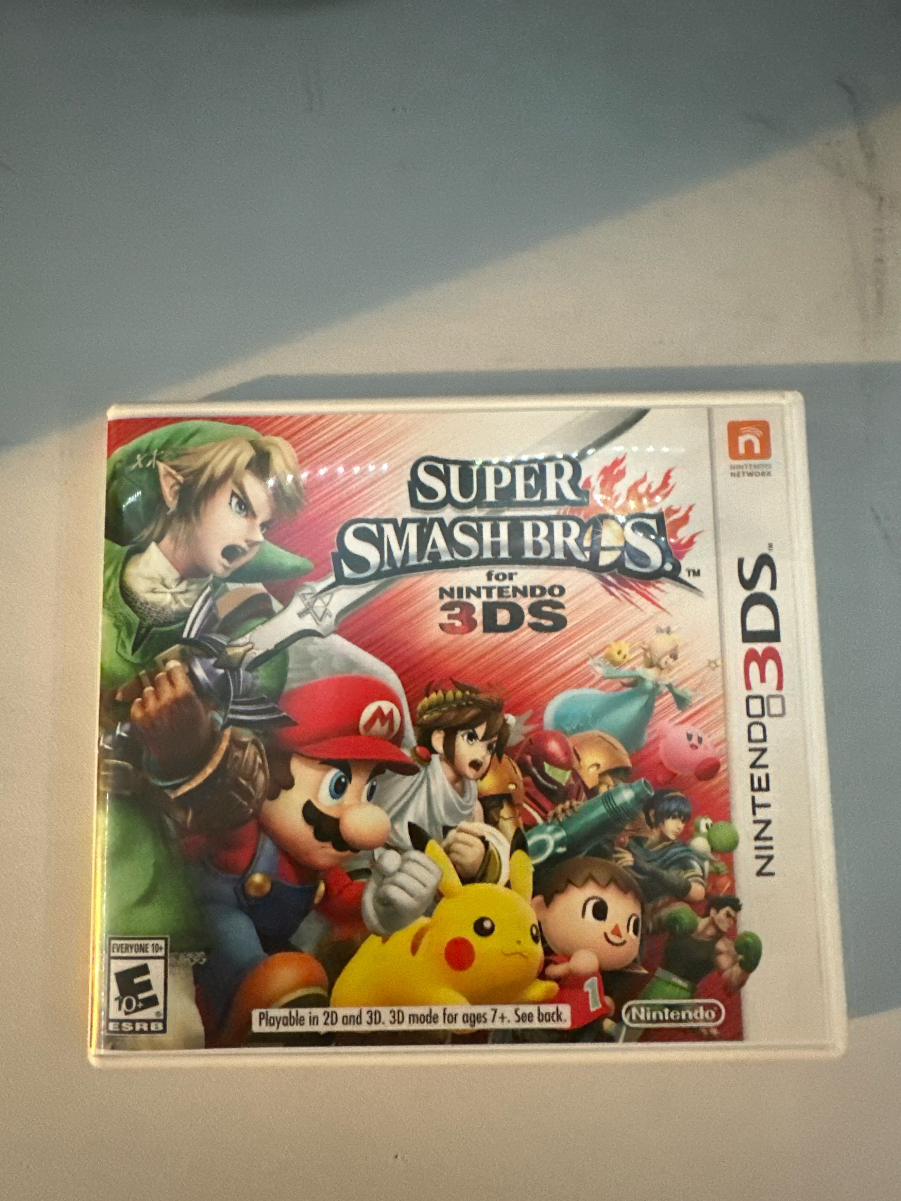Picture of my own copy of Super Smash Bros. 3Ds. Taken by Abyan Ahmed, 4 Apr. 2025. iPhone 14 Pro. © Abyan Ahmed, 2025. CC BY-NC 4.0.