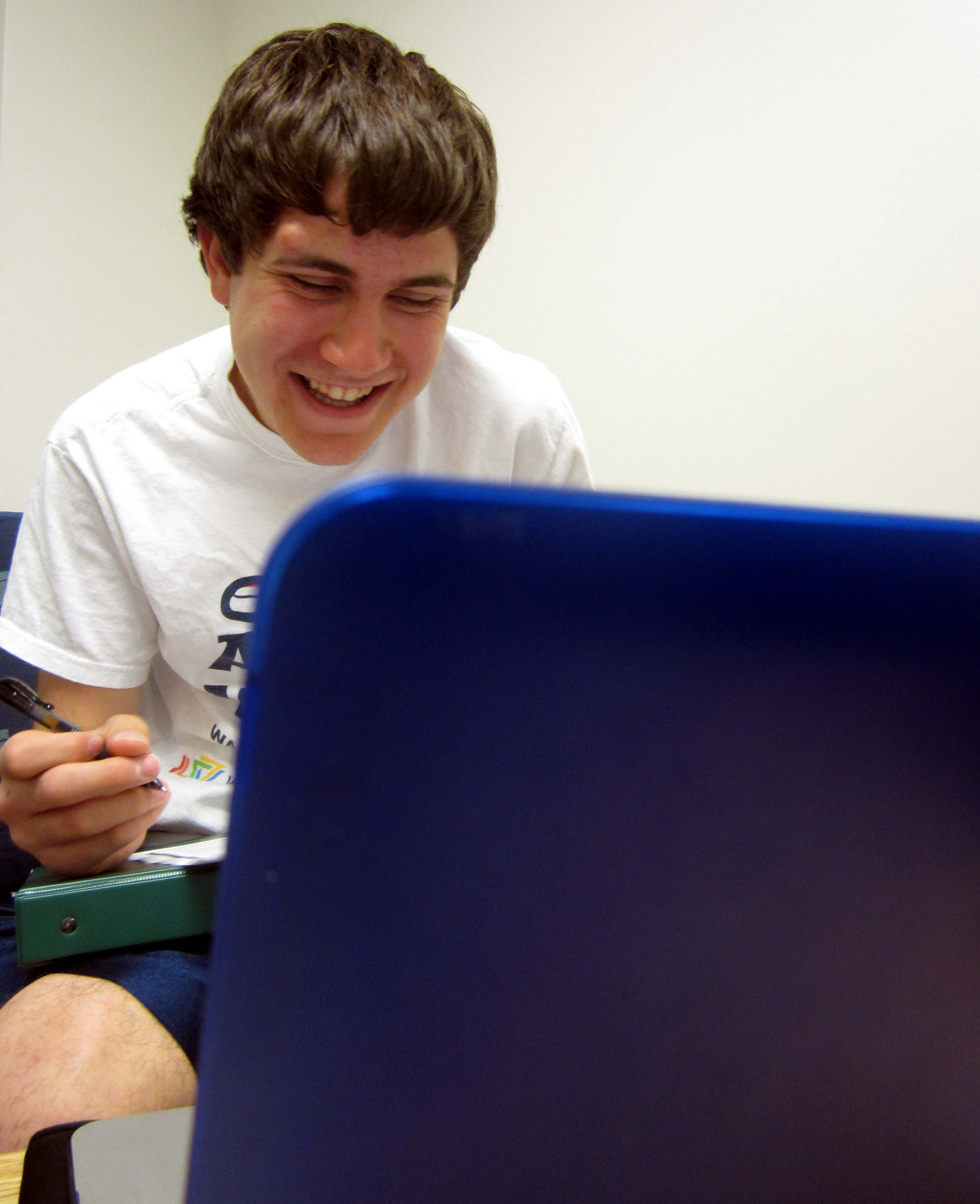 happy boy at computer