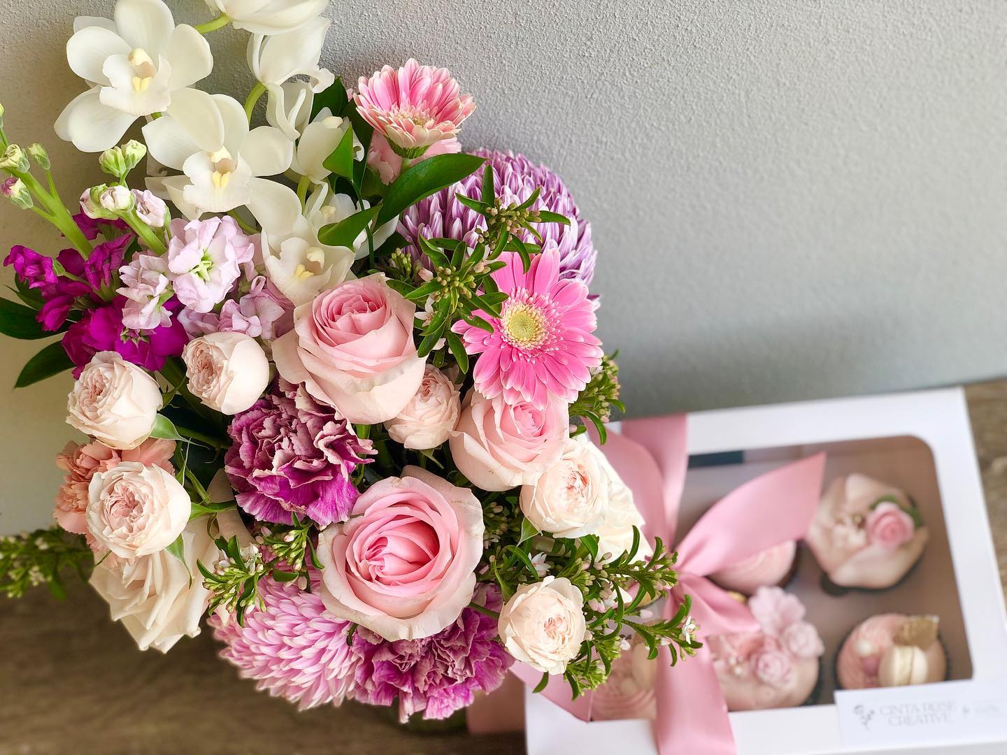 Birthday Bouquet with cupcakes- Tapodi, J. (n.d.). Cupcake and Floral Vase Gift Sets [Photograph]. Cinta Rose Creative. https://www.cintarosecreative.com.au/shop