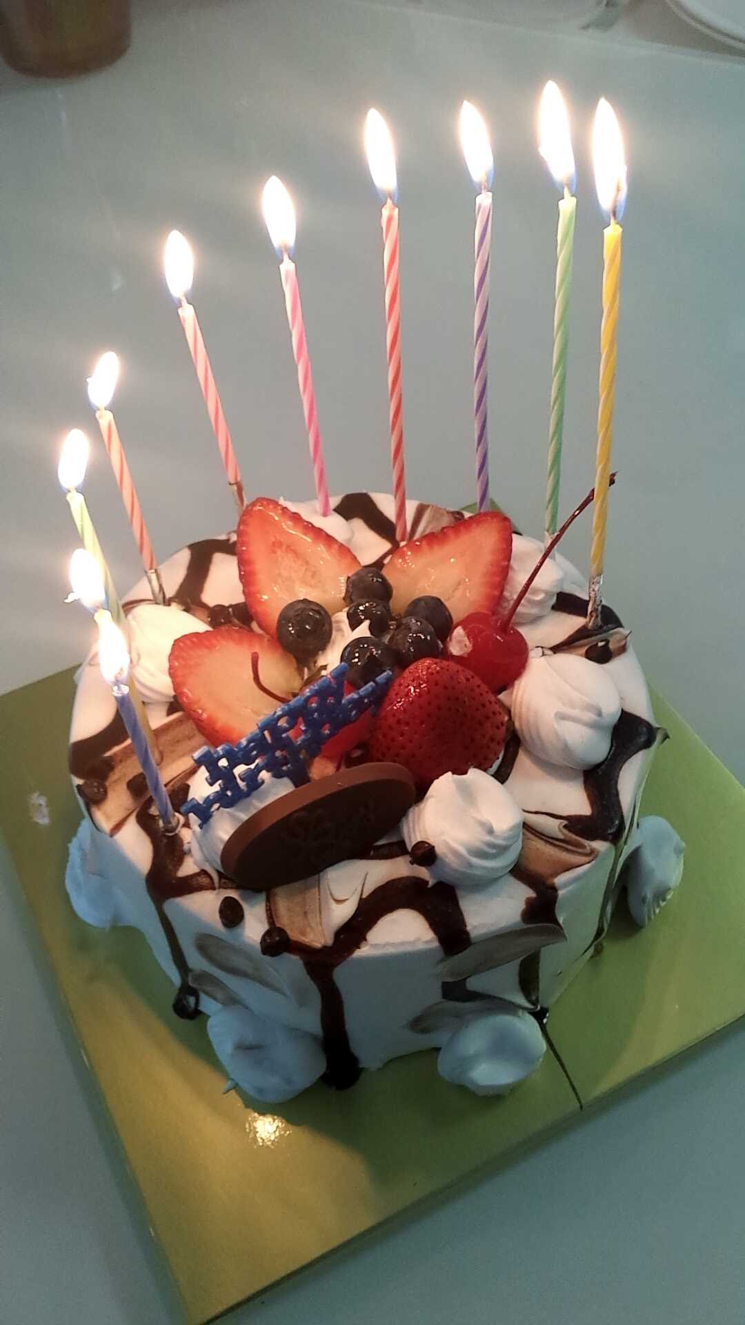 candles, strawberries, chocolate, whipped cream, blueberries, cake