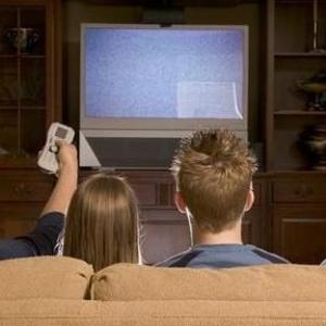 a family watching tv