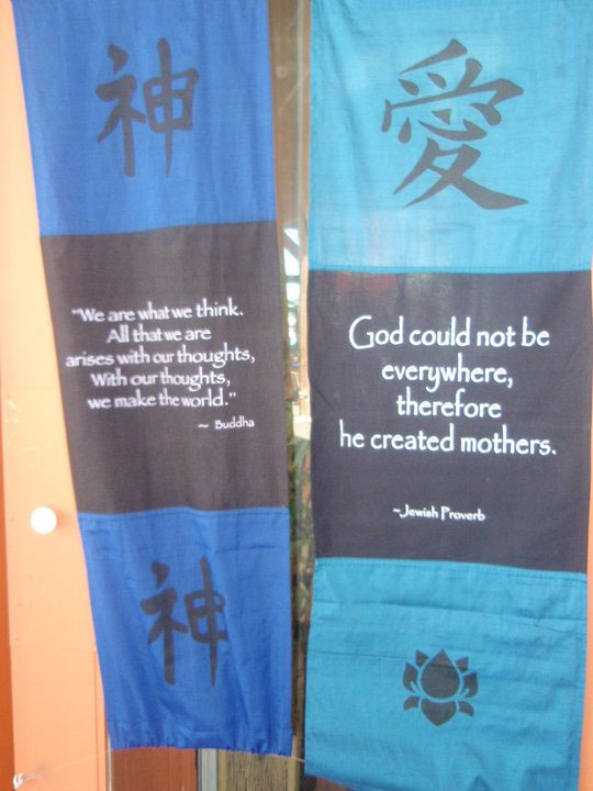 A picture of two banners with two different proverbs by Budda and the other is a Jewish Proverb.