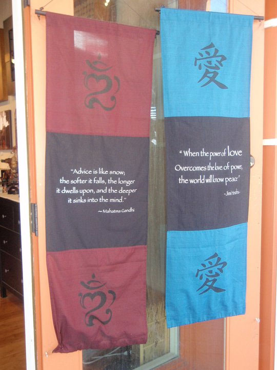 Two Proverbs written on two different banners by Gandhi and the other by Jimmy Hendrix.