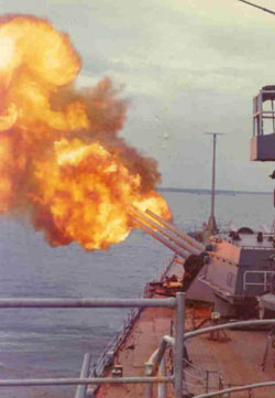USS Newport News (CA-148) firing #1 turret.